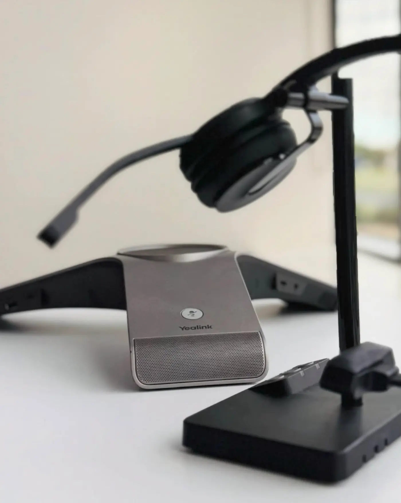 Desk phones connected together representing a PBX business phone system for small business communication.